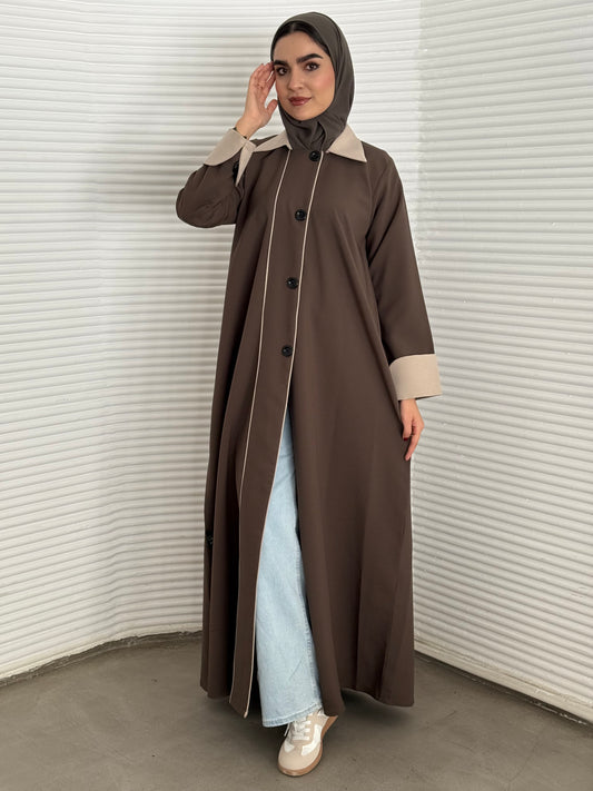 An olive abaya of a coat-style, the abaya is perfect for office wear and corporate events.