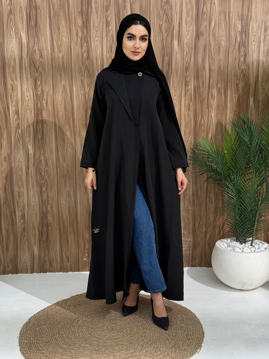A black coat-style abaya is good for the office, boardroom, or an evening dinner and travel.