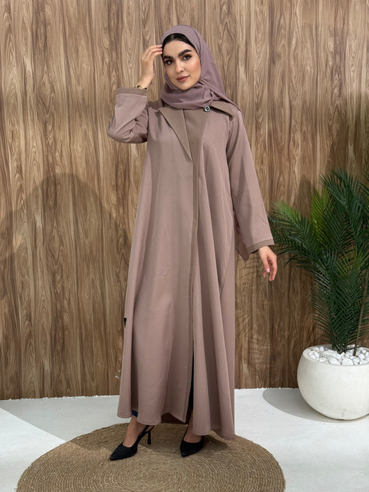 A mocha brown coat-style abaya is good for the office, boardroom, or an evening dinner and travel.