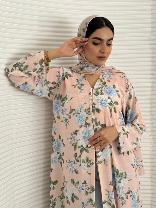 A pink and blue floral chiffon abaya, an elegant abaya that is perfect for summer, daytime events, and brunch.