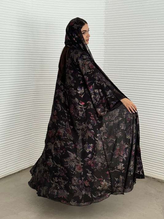 A black floral chiffon abaya, an elegant abaya that is perfect for summer, evening wear.