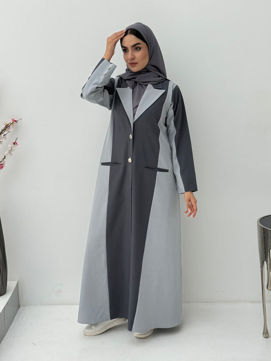 Woman wearing a long, two-tone Dark Dark Grey & Light Grey Linen Abaya with a matching sheila on a white background