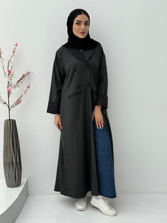 Woman wearing a Black Pinstripe Linen Coat Abaya with a white background