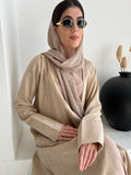 A woman wearing a Light Brown Linen Abaya with inner dress and a matching Sheila