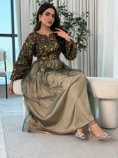 A woman wearing a floral long-sleeve  Dark Green Embroidered Tulle Dress