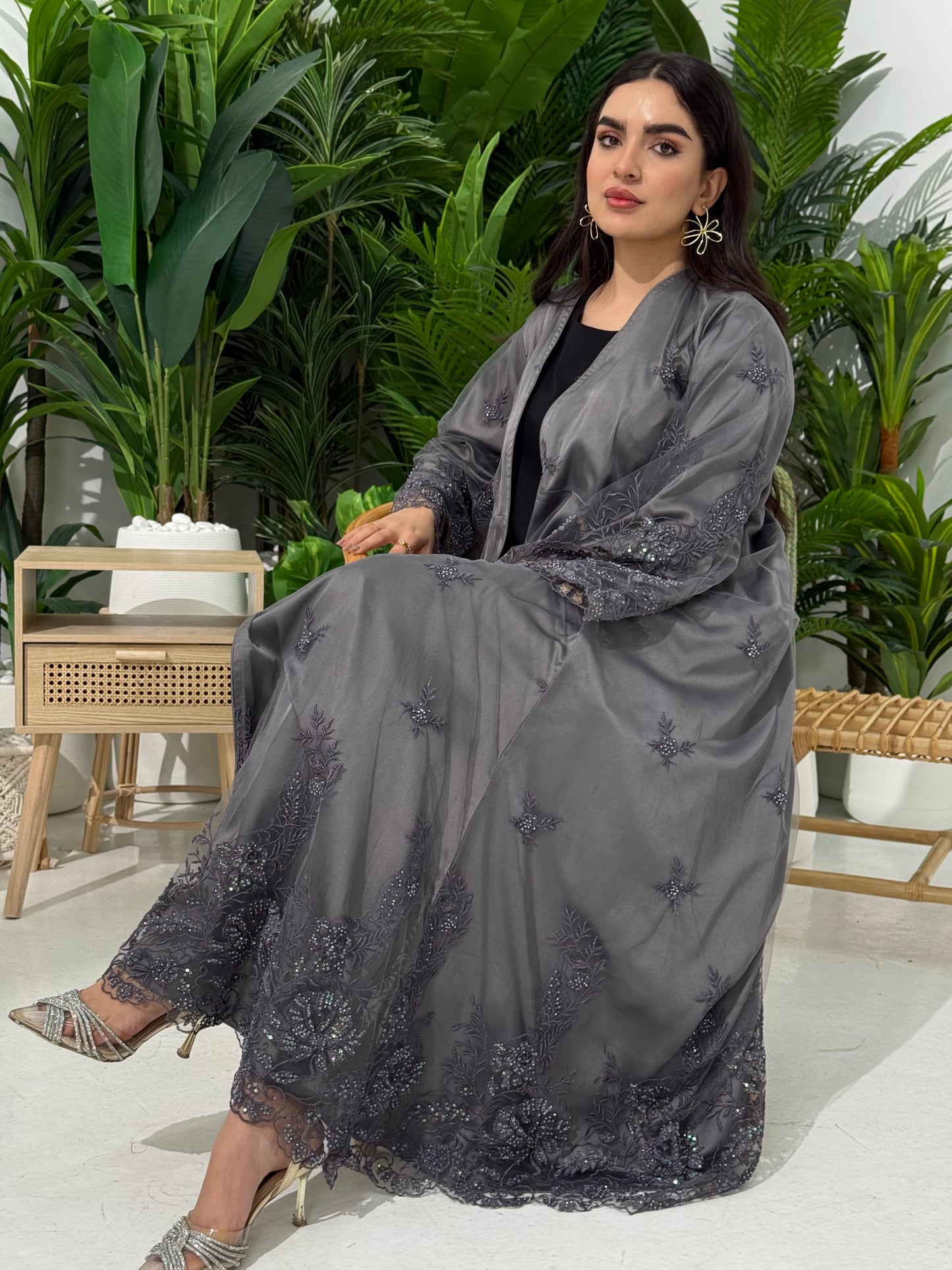 A dark grey abaya with embroidery and dantel(lace) perfect for weddings and Eid celebrations.