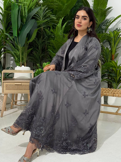 A dark grey abaya with embroidery and dantel(lace) perfect for weddings and Eid celebrations.