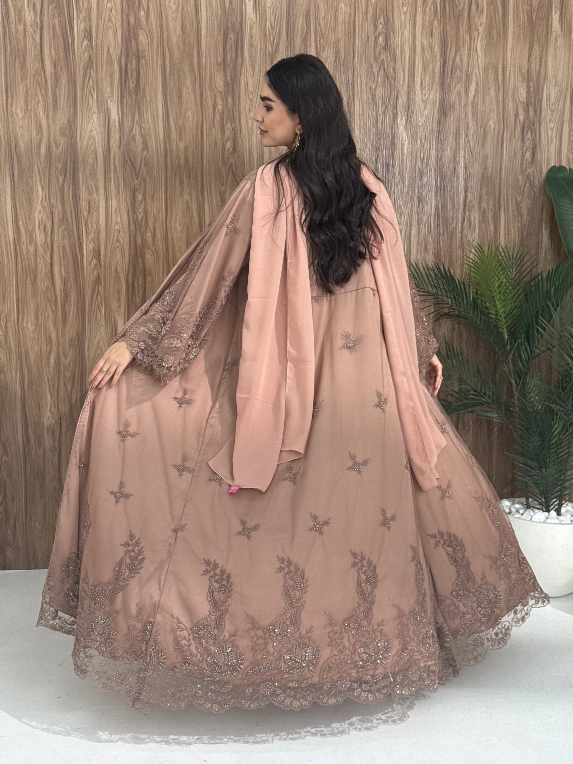 A dusty pink dantel (lace) embroidery abaya perfect for Eid and celebration.