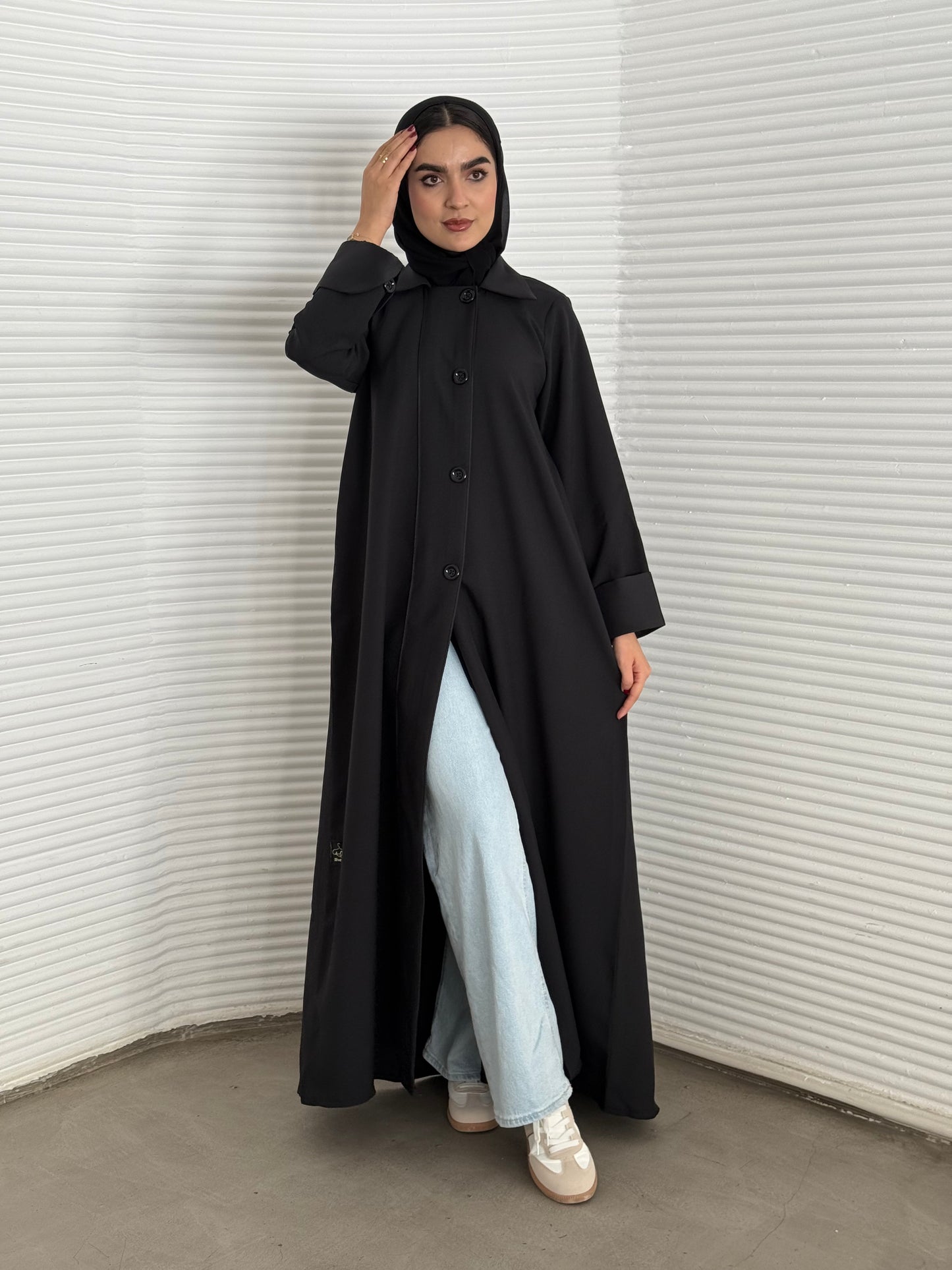 A black abaya, linen fabric perfect for everyday office wear and corporate events.