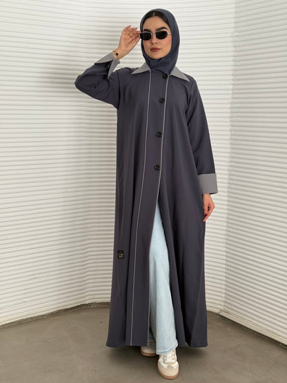 A dark grey abaya a linen fabric coat-style abaya, perfect for office wear, university and corporate events.
