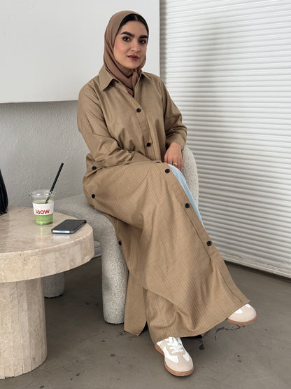 A beige pinstripe abaya perfect for everyday office wear and weekend outings