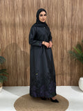 A dark grey floral satin abaya, with a unique look, perfect for events and occasions.