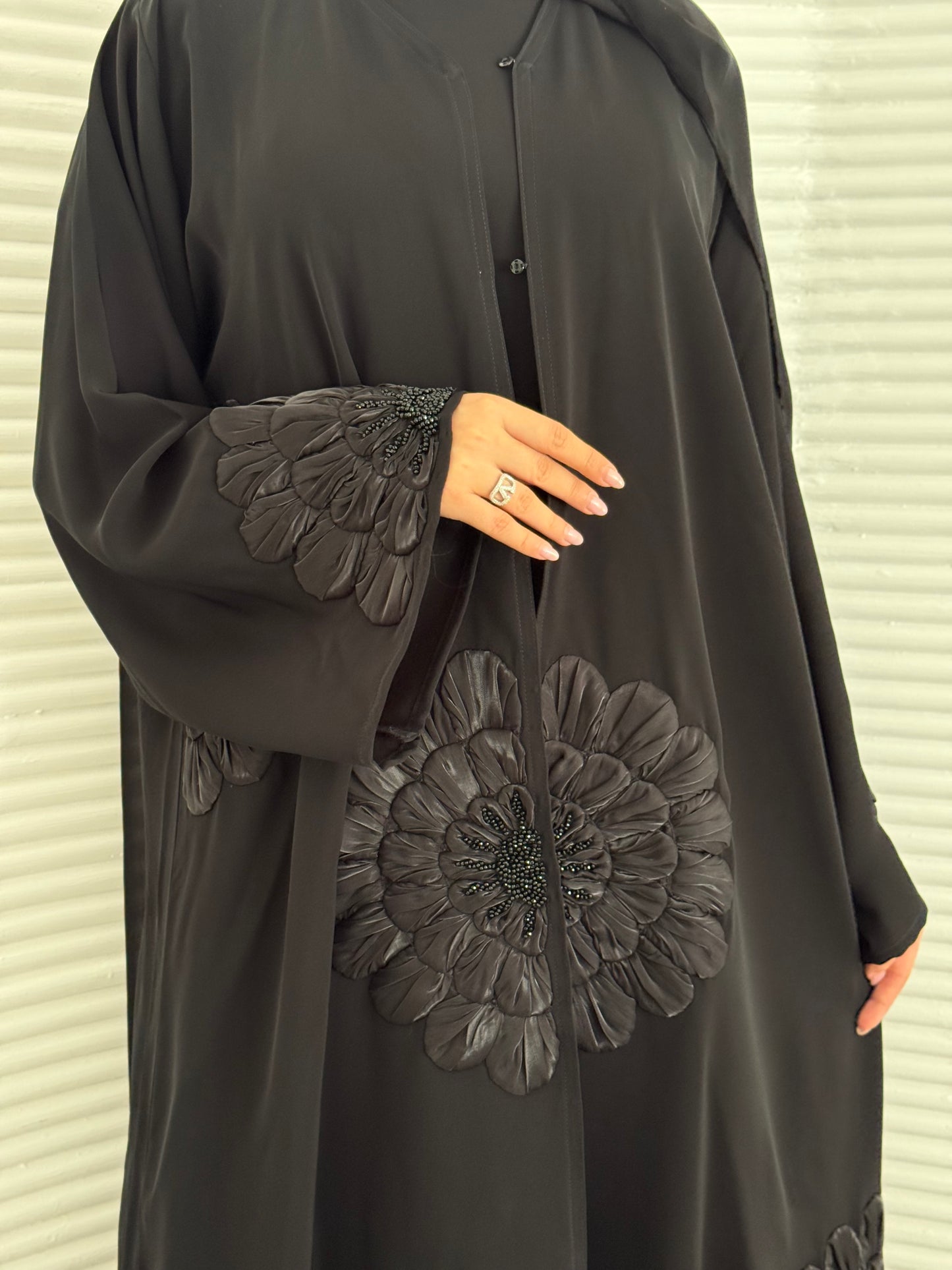 A premium nida fabric abaya, a black abaya that is elegant piece which offers effortless style, perfect for evening events and any occasion.