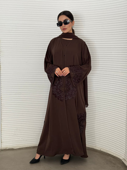 A premium nida fabric abaya, a chocolate brown abaya that is elegant piece which offers effortless style, perfect for evening events and any occasion.