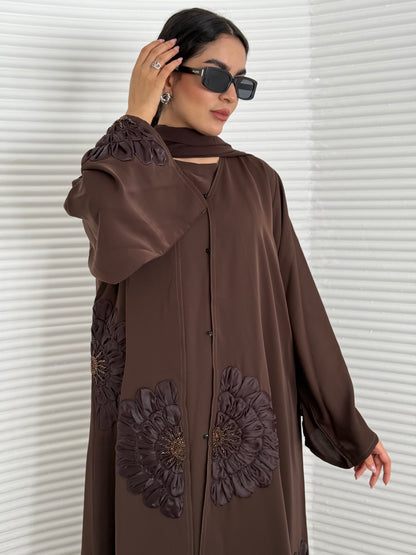 A premium nida fabric abaya, a chocolate brown abaya that is elegant piece which offers effortless style, perfect for evening events and any occasion.