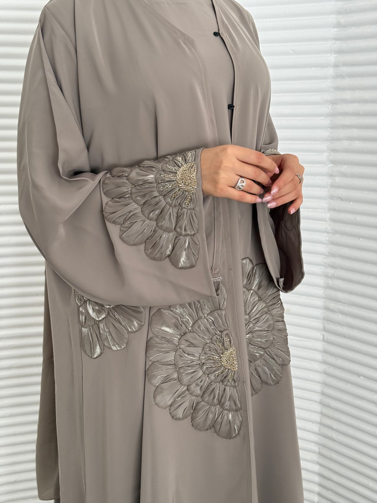 A premium nida fabric abaya, a light brown abaya that is elegant piece which offers effortless style, perfect for evening events and any occasion.