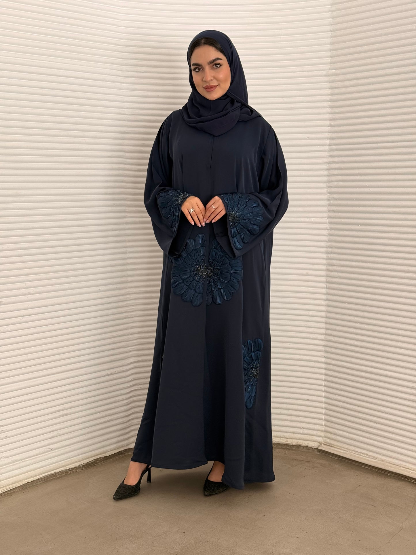 A premium nida fabric abaya, a navy blue abaya that is elegant piece which offers effortless style, perfect for evening events and any occasion.