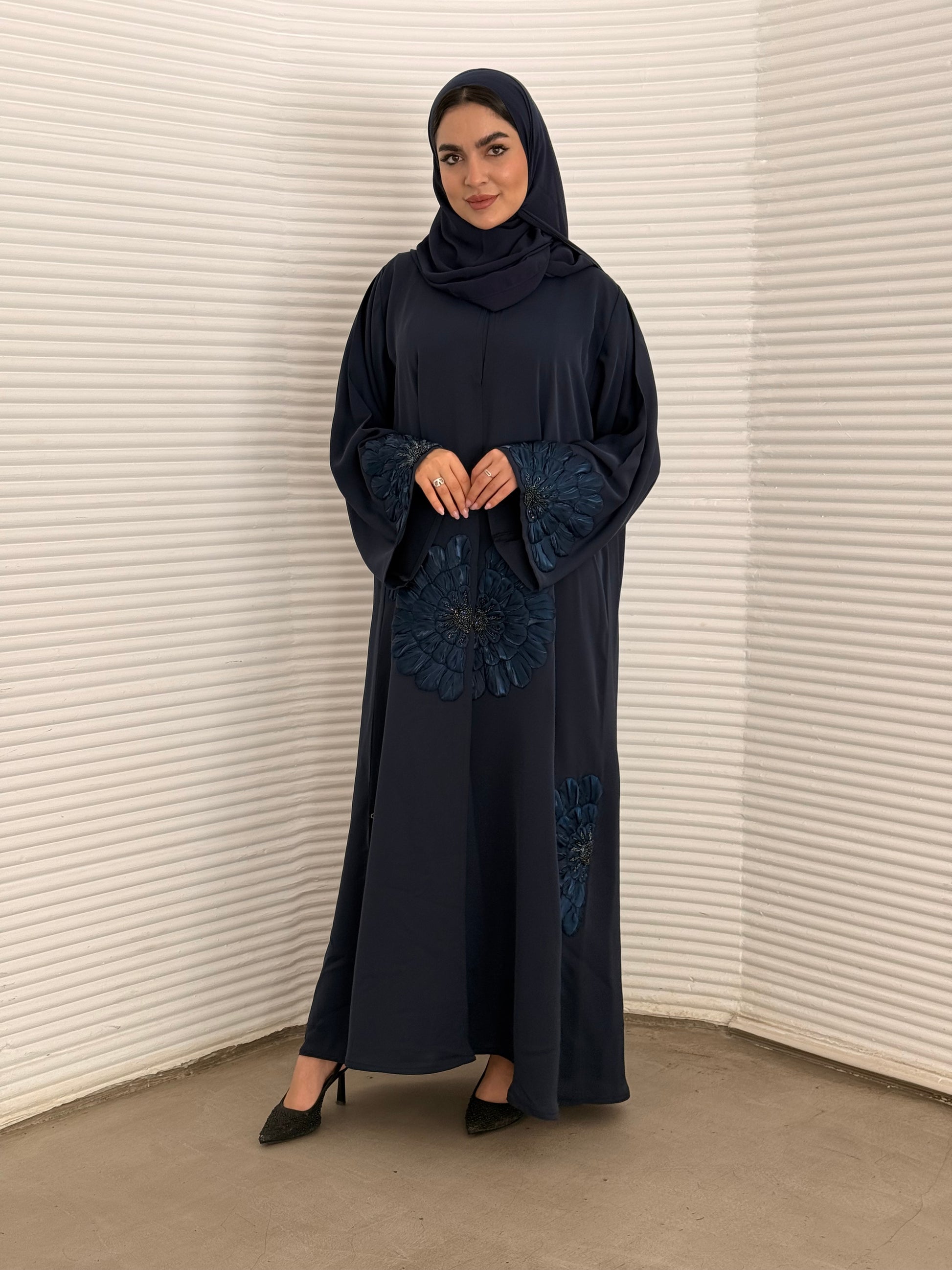 A premium nida fabric abaya, a navy blue abaya that is elegant piece which offers effortless style, perfect for evening events and any occasion.
