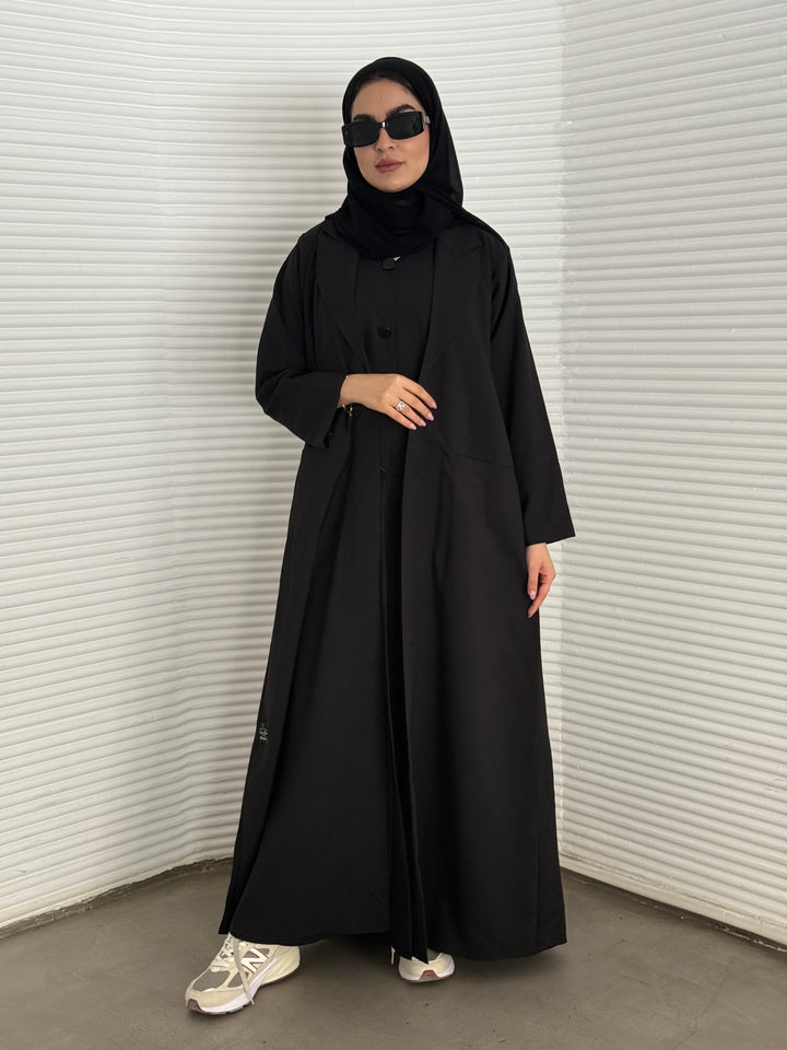 A premium linen black abaya with a matching sheila, perfect for formal occasions and travel.