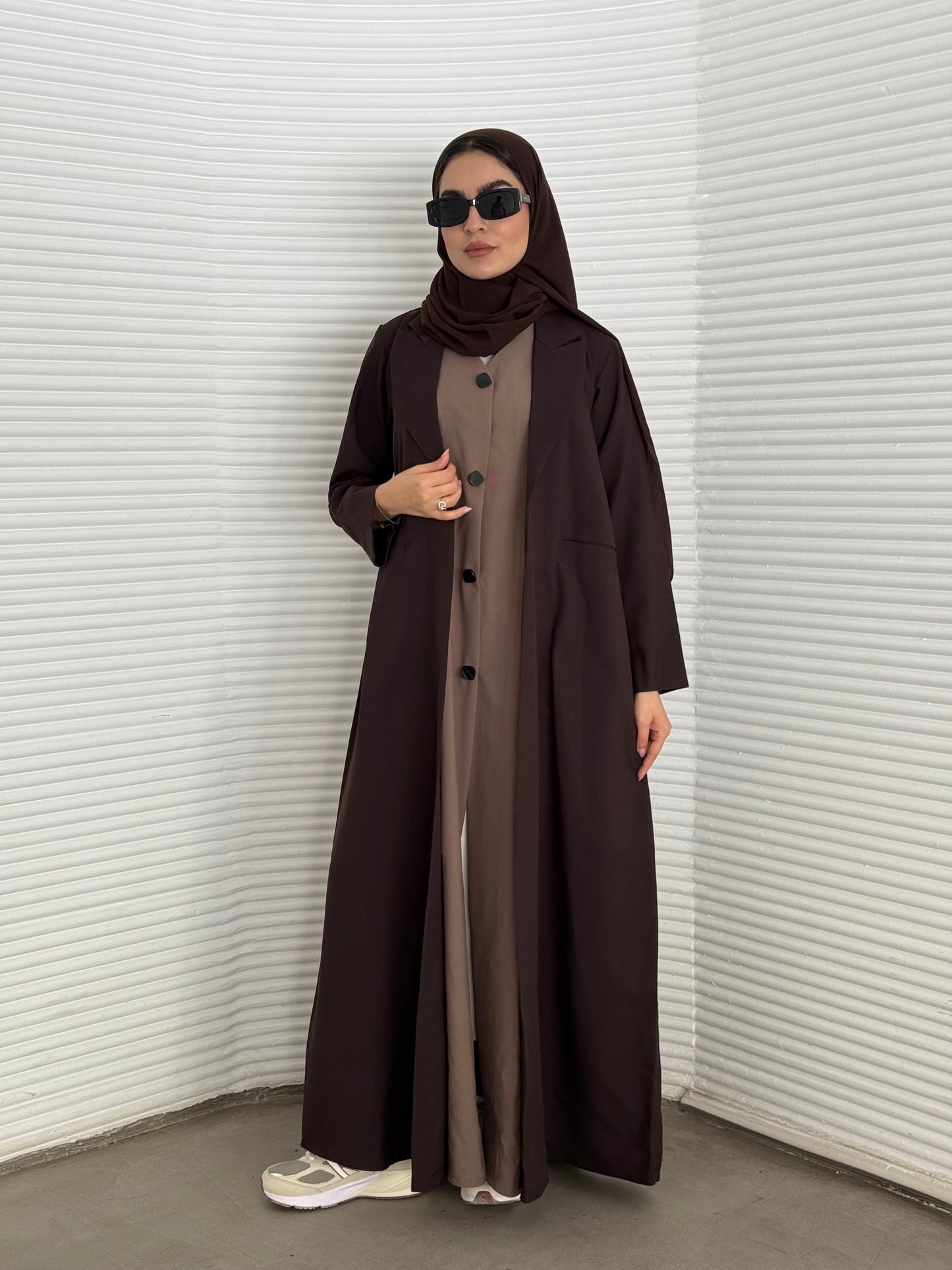 A premium linen dark brown  abaya with a matching sheila, perfect for formal occasions and travel.