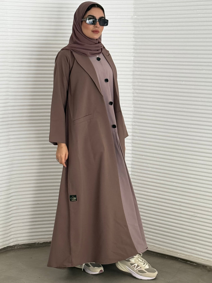 A premium linen mushroom brown  abaya with a matching sheila, perfect for formal occasions and travel.