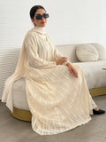 A 3 set of cream abaya, that includes a matching inner dress and sheila, this set is perfect for effortless evening luxury.