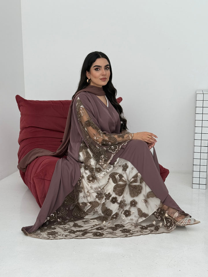 A cocoa brown abaya, made of premium dantel (lace) and nida fabric, this abaya is perfect for Eid and parties.