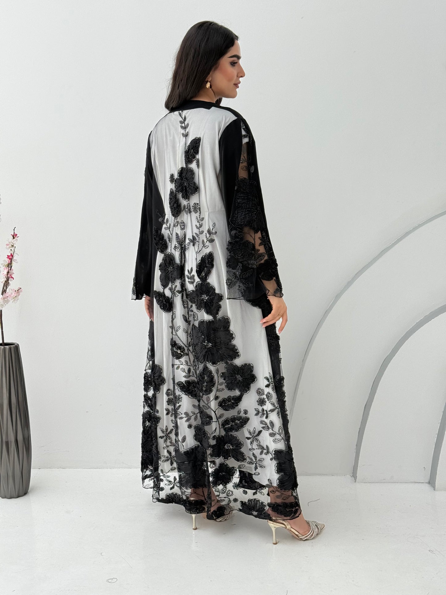 A black abaya, this luxurious piece is made of lace/dantel with a premium Nida fabric, this abaya is perfect for engagement and daytime weddings.