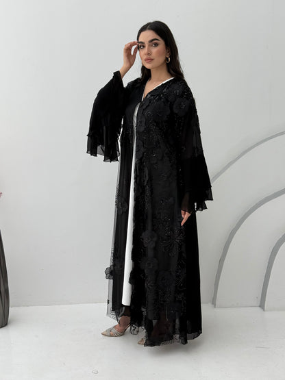 A luxurious black abaya with chiffon and texture of Black floral lace. This abaya is perfect for evening outings and occasions.