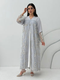A luxurious and romantic light grey abaya with floral lace and Nida fabric, that is perfect for engagements, henna parties and weddings.