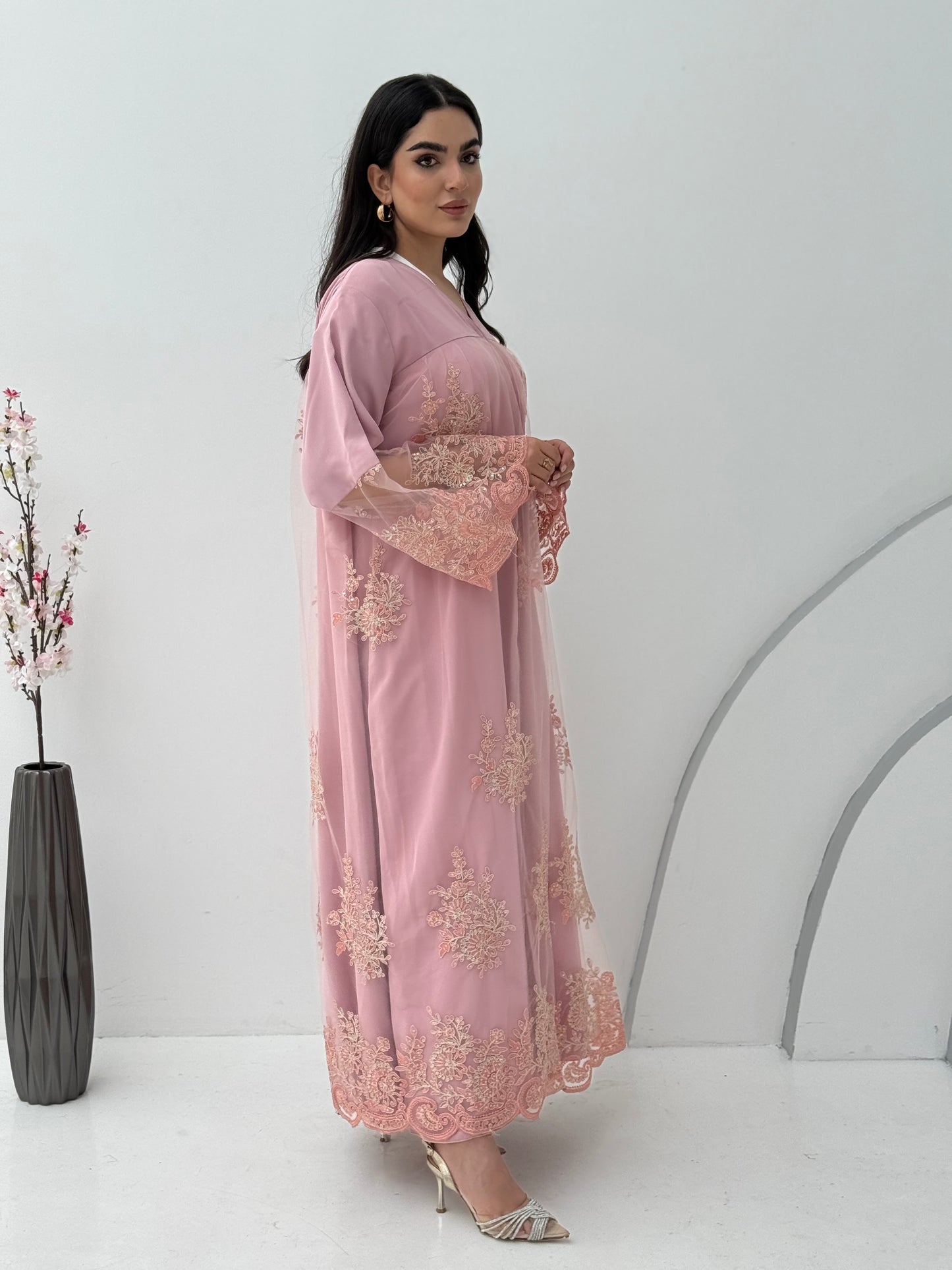 A dusty pink embroidery nida abaya, a very comfortable abaya for gatherings.