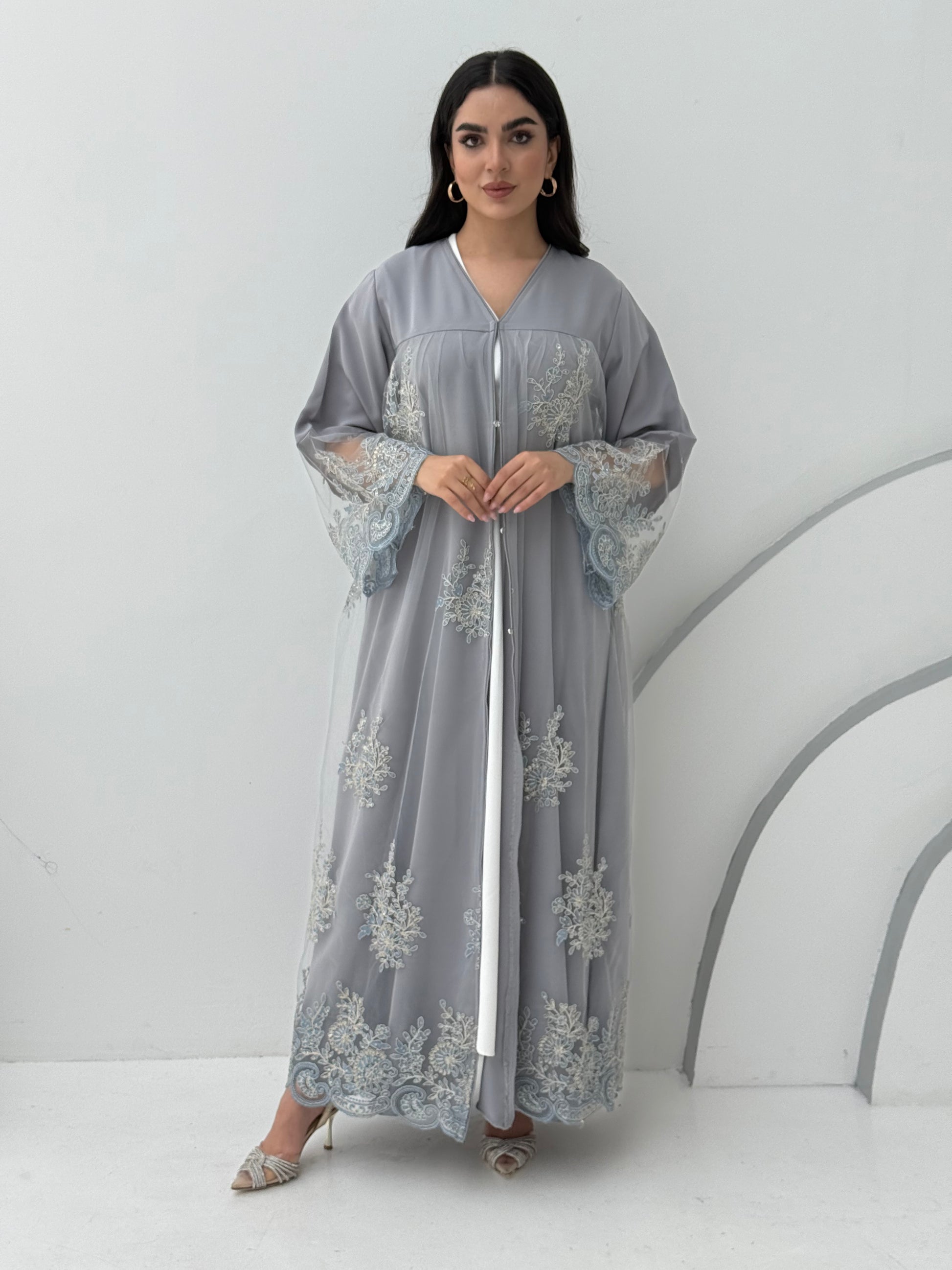 A silver grey embroidery nida abaya, a very comfortable abaya for gatherings.
