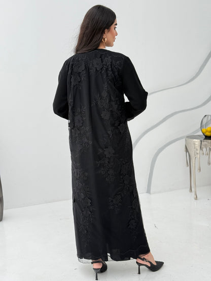 A luxury premium black abaya, the abaya is made of nida fabric with lace designs. Perfect for formal events.