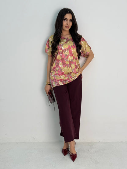 A deep burgundy(maroon) abaya set that includes a coat abaya, matching pants, printed top, and sheila. This set is perfect for formal events, office wear, and university.