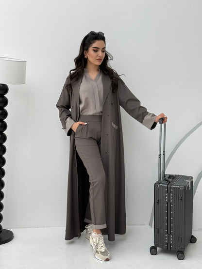 A set of brown  abaya that includes matching trousers, coat abaya, inner top and sheila. This abaya set is perfect for travels and corporate events.