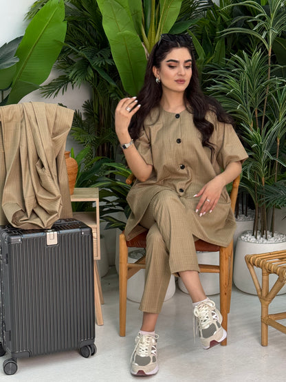 A beige pinstripe 4 piece abaya set that includes a coat abaya, matching trouser, waistcoat top and sheila. This abaya set is perfect for daytime formal events or office wear and travel.