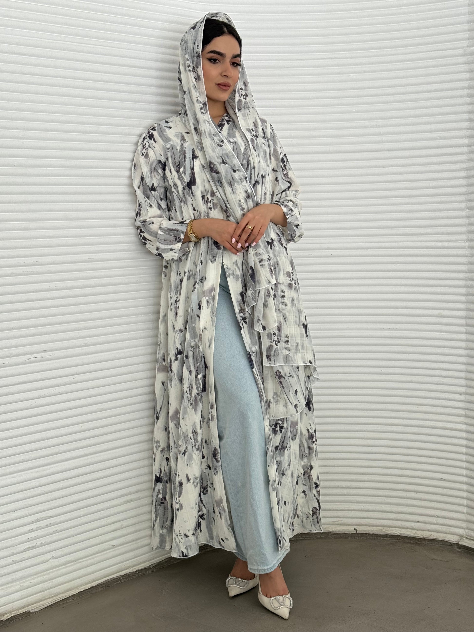 A grey printed satin abaya, an elegant abaya that is perfect for summer, daytime events, artistic gatherings.
