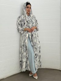 A grey printed satin abaya, an elegant abaya that is perfect for summer, daytime events, artistic gatherings.