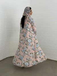 A pink and blue floral chiffon abaya, an elegant abaya that is perfect for summer, daytime events, and brunch.