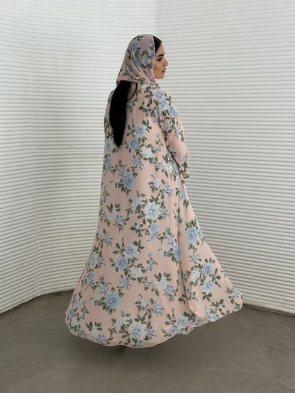 A pink and blue floral chiffon abaya, an elegant abaya that is perfect for summer, daytime events, and brunch.