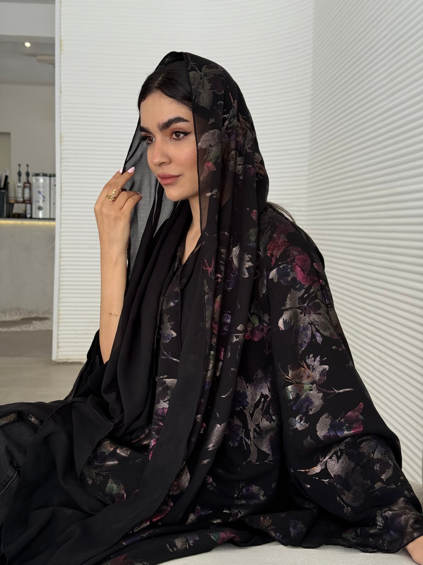 A black floral chiffon abaya, an elegant abaya that is perfect for summer, evening wear.