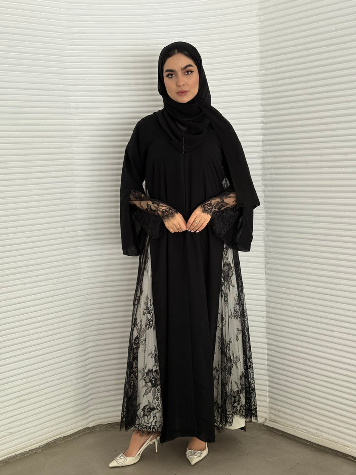 Classic black abaya with smooth crepe and sheer lace. Making it an exquisite choice for evening wear.