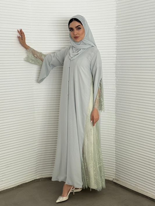 Classic Ice grey abaya with smooth crepe and sheer lace. Making it an exquisite choice for Eid, Weddings and morning formal events.