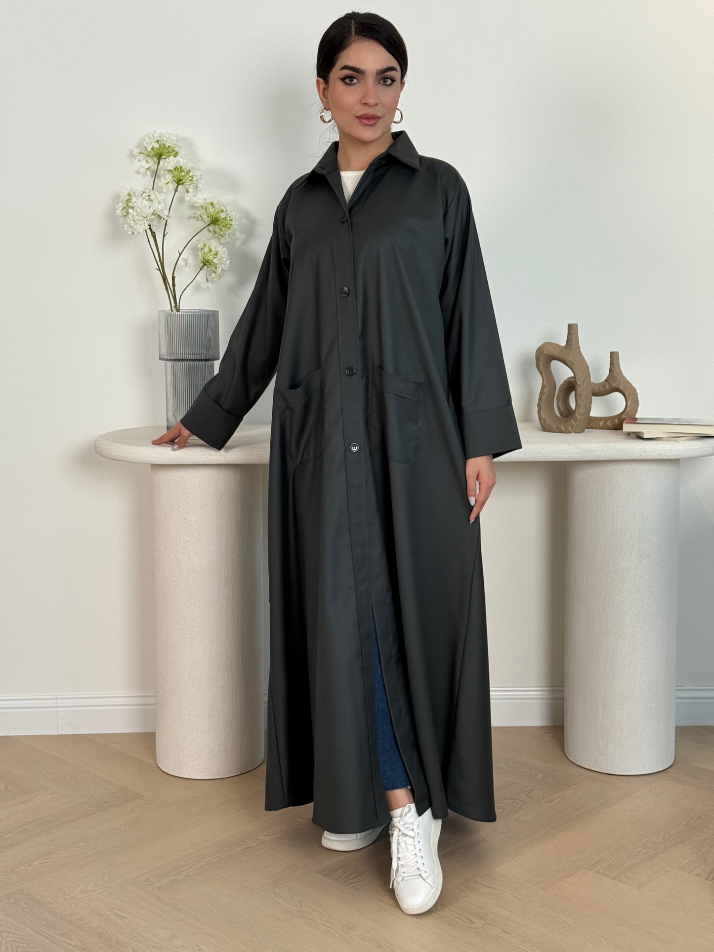 A dark grey linen abaya with smart collar and practical pockets, a perfect choice for office wear and everyday wear.