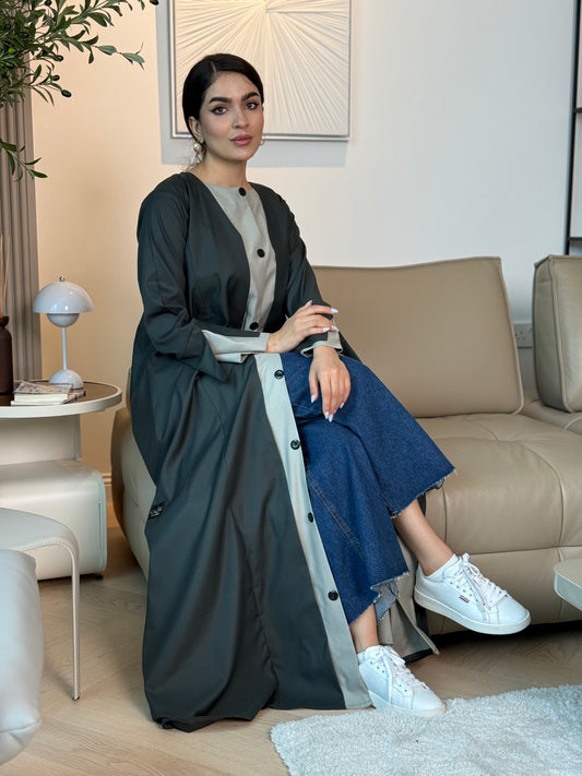 A forest green linen abaya with button-down front, a perfect choice for office wear and everyday wear.