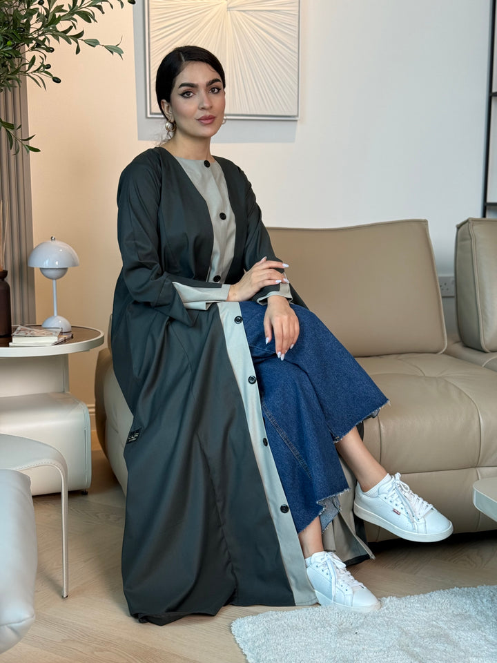 A forest green linen abaya with button-down front, a perfect choice for office wear and everyday wear.