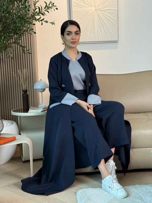 A navy blue 3-piece abaya set that includes an open abaya, matching trouser, inner top and sheila. This abaya is perfect for events, business settings/meetings.