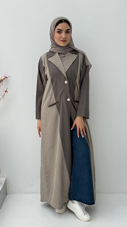 Woman wearing a long, two-tone Dark Brown & Light Brown Linen Abaya with a matching sheila on a white background