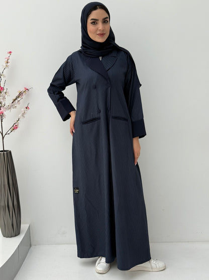 Woman wearing a Navy Blue Pinstripe Linen Coat Abaya with a matching sheila against a white background