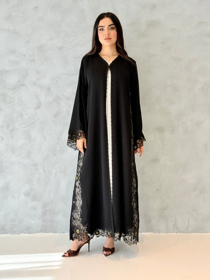 Person wearing a Premium Gold Hand-Embellished Abaya made from Nida fabric and Sheer Mesh Panel outfit on a white background